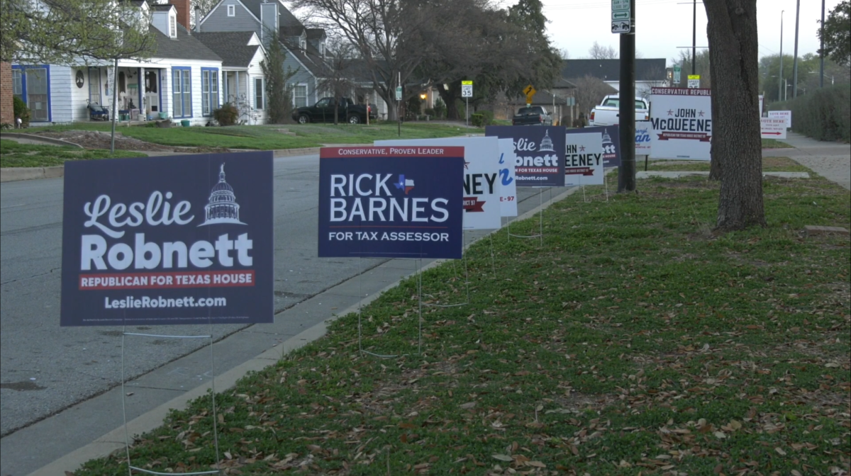 Candidates%E2%80%99+signs+line+the+outside+of+the+polling+location+at+Paschal+High+School.